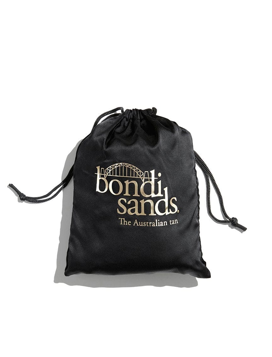 Self Tanning Sheet Protector in a Drawstring Bag